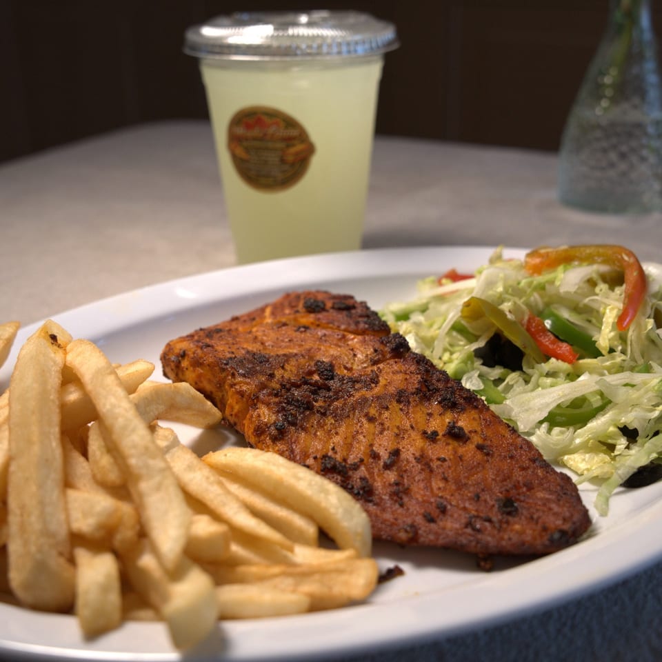 Chicken plate with fries and salad