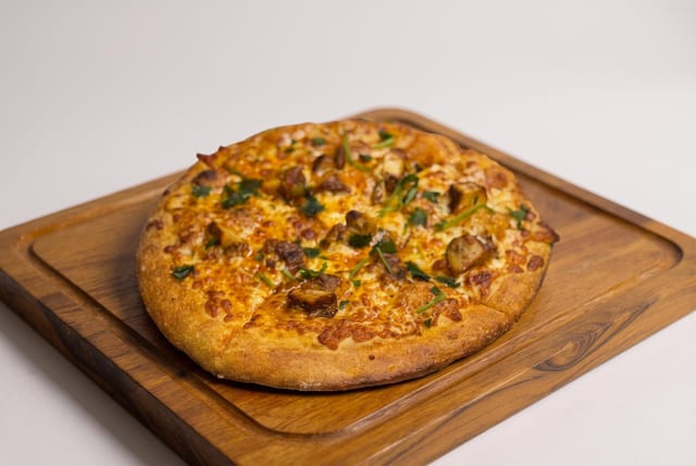 Butter Chicken Pizza.